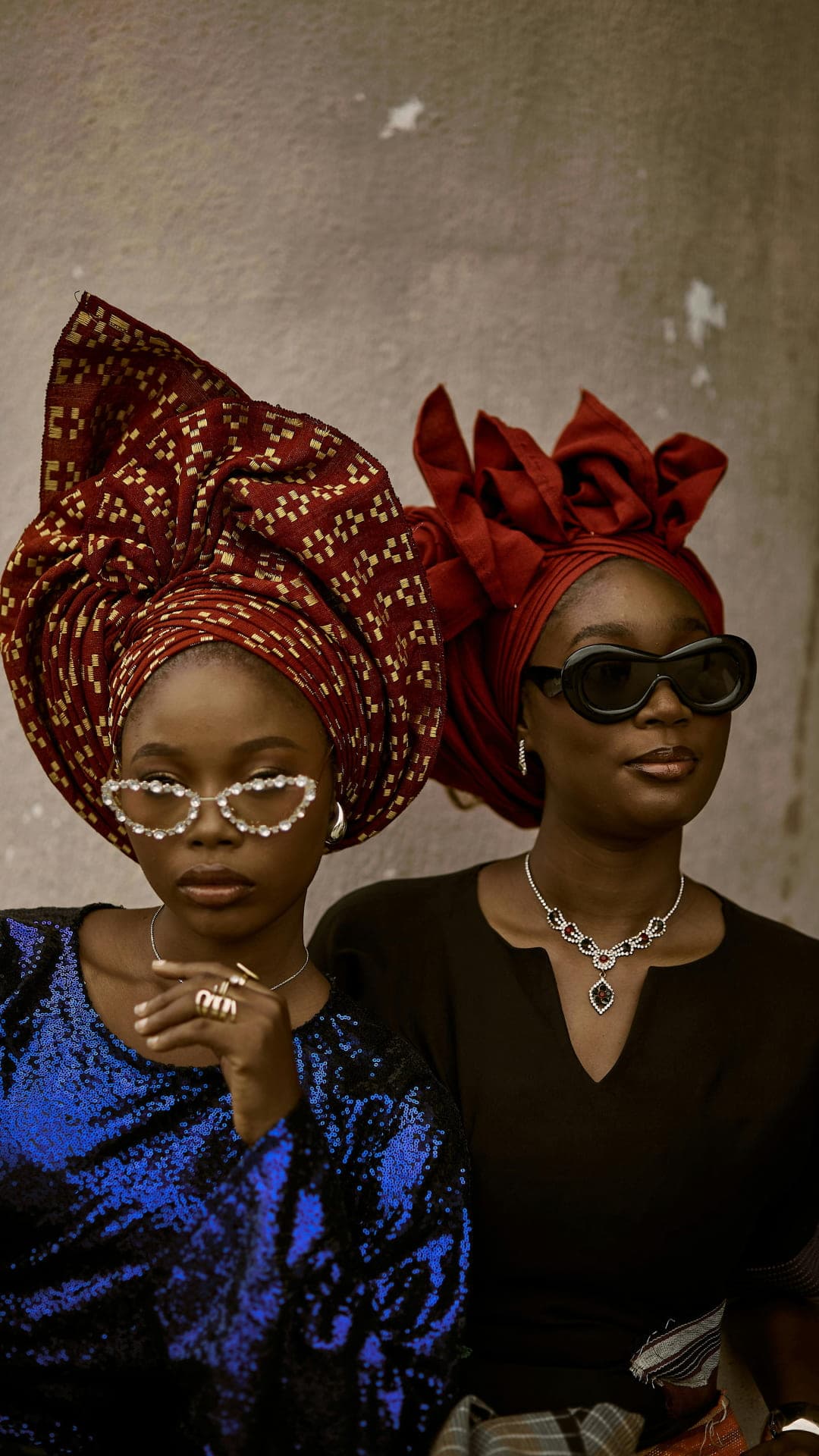 Two women in red gele