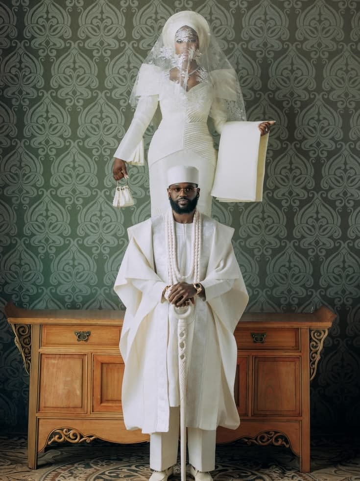 Yoruba couple in traditional gold aso oke